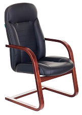 Кресло руководителя T-9923WALNUT-AV/BL цвет черный ,низкая спинка,  материал натуральная кожа, полозья дерево цвет «темный орех», Нагрузка: до 120 кг.